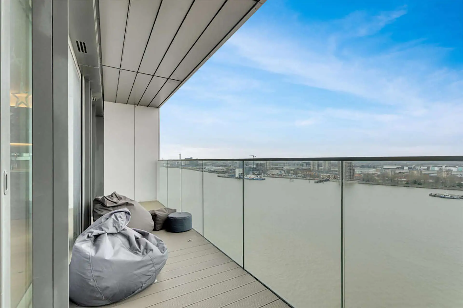 Stunning balcony with views over the River Thames in Duke of Wellington Avenue | IIG Estates