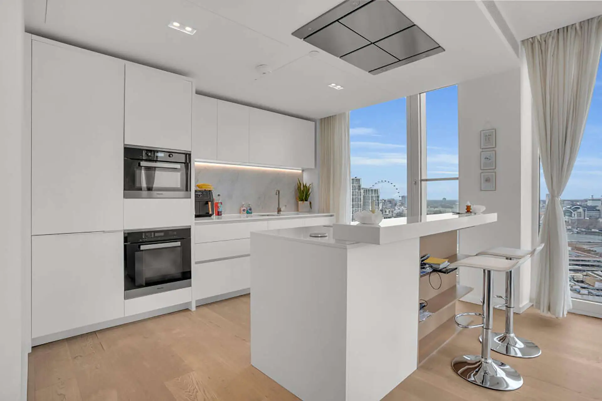 Kitchen and breakfast bar in Embassy Gardens London SW11 | IIG Estates